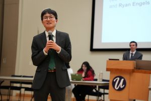 A photo of USG President, Andy Zhang, at a USG Senate meeting